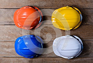 Yellow, Orange, White and Blue protective safety helmet