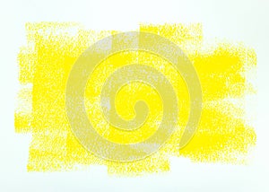 Yellow paint roller strokes on white paper. abstract background