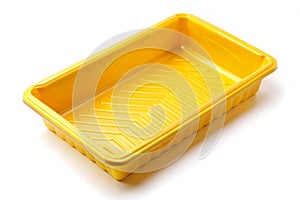 Yellow paint tray isolated over white