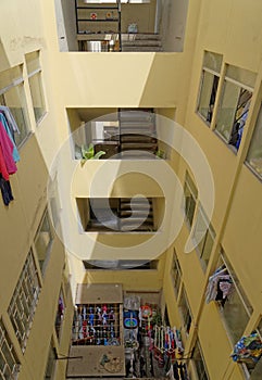 Yellow painted inner stairwell photo