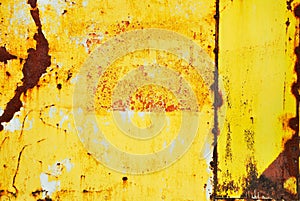 Yellow painted metal with rust texture