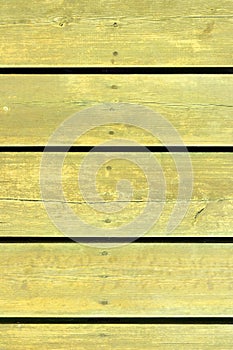 Yellow painted plank background