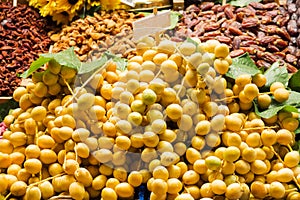 Yellow palm berries and dried fruits in Istanbul street market