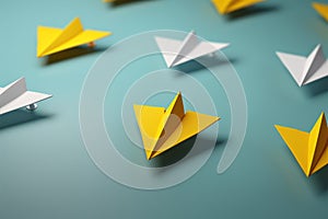 Yellow paper airplane leads a group of white planes