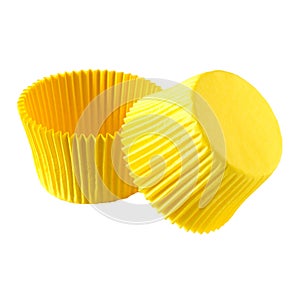 Yellow paper baking forms for muffins and cupcakes