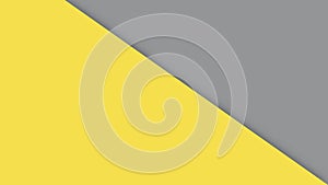 Yellow paper on gray background, 2021 trendy colors