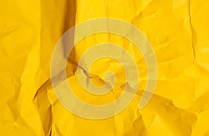 Yellow paper texture. Crumpled paper background.