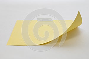 Yellow paper on white
