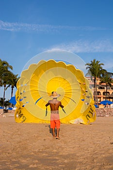 Yellow parasail on the beach