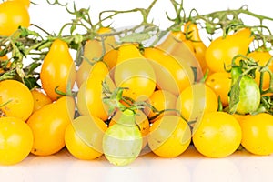 Yellow pear tomato isolated on white