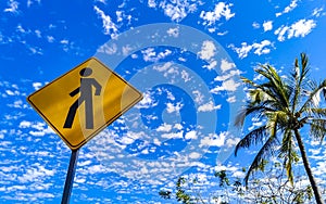 Yellow pedestrian sign street sign in Puerto Escondido Mexico