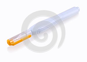 Yellow pen corrector on a white background.