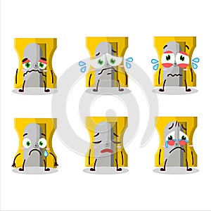 Yellow pencil sharpener cartoon character with sad expression