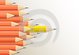 Yellow pencil standing out from orange pencils, leadership,difference and stand out from the crowd  business concept