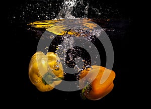 Yellow peppers in water