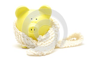 Yellow piggy bank with neckerchief