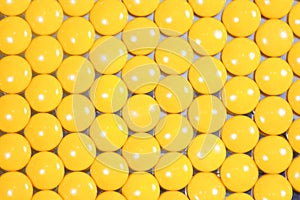 Yellow pills background