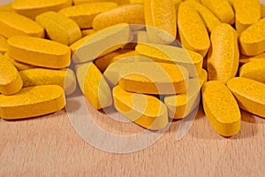 Yellow pills background