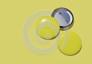 Yellow pin baddges on yellow background