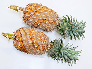 Yellow pineapple on white