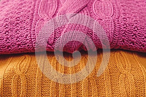 Yellow and Pink Knitted Items.Hand Made;Fancywork.Background photo