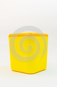 Yellow plastic bucket