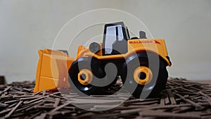 Yellow plastic bulldozer toy5