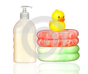 Yellow plastic duck over sponges and boat bath