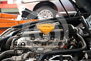 Yellow plastic funnel for pouring oil