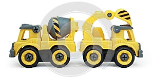 yellow plastic toy of concrete mixer and ecavator truck isolated on white background.