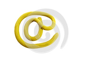 Yellow plasticine arroba email sign