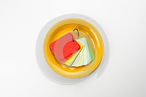 Yellow plate with a color palette, top view