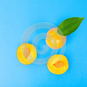 Yellow plum fruit on the white