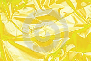 Yellow polyethylene texture. Background exhaust cellophane package