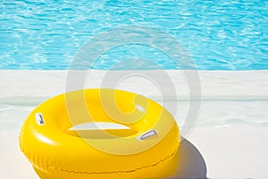 Yellow pool float in the swimming pool