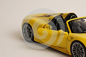Yellow Porsche 918 Spyder model car side view open door