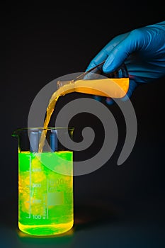 Yellow pouring from flask