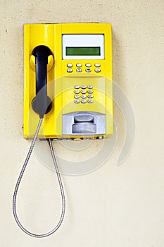 Yellow public telephone