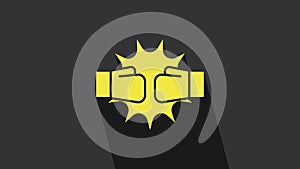 Yellow Punch in boxing gloves icon isolated on grey background. Boxing gloves hitting together with explosive. 4K Video