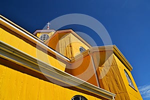 Yellow and purple church of Castro, Chiloe, Chile