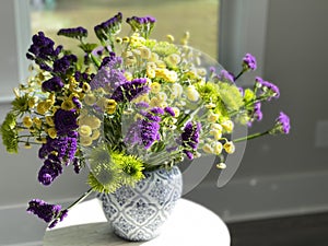 Yellow and purple flower bouquet