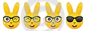 Yellow rabbits wearing glasses. Set of glossy 3d icons. Laughing and winking bunny sticker