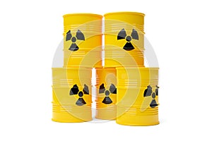 Yellow radioactive waste drum barrels stack with warning symbol over white background