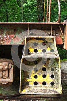 Yellow railroad flatcar steps