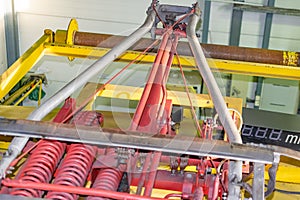 yellow railway pantograph on the train