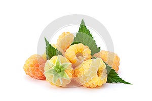 Yellow raspberry berries on white