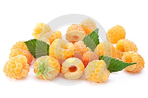 Yellow raspberry berries on white