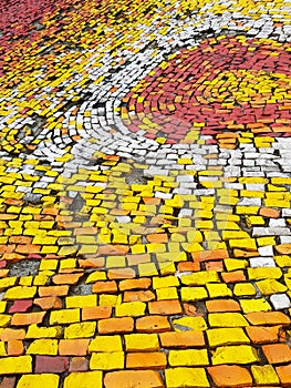 Yellow and Red Brick Walking Path. The stone texture in yellow color