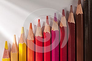 Yellow, red and brown crayons