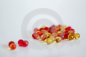 yellow and red capsules with vitamin a and E